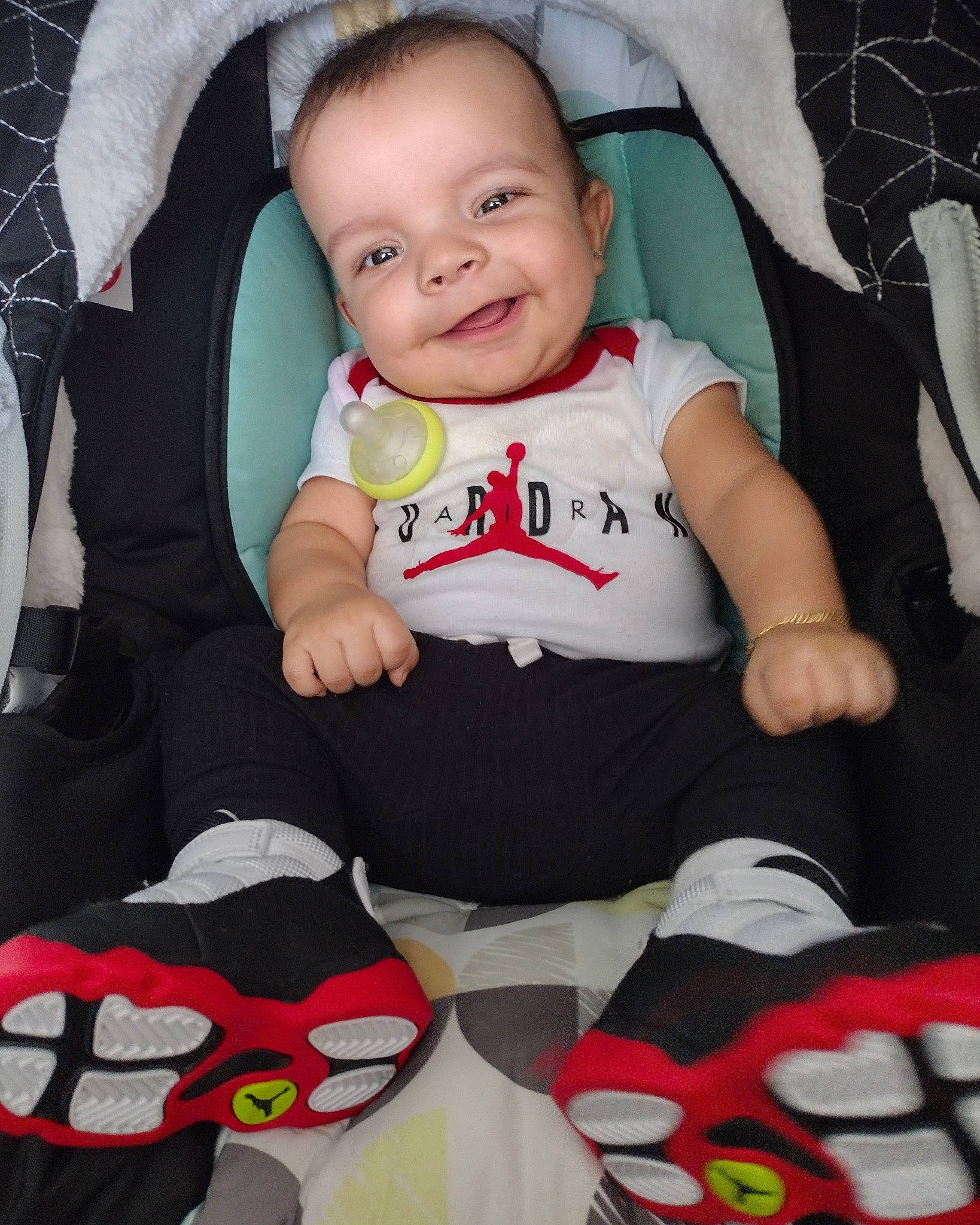 Zaryan joined the competition — help win amazing prizes! baby, baby_toddler_clothing, black, cheek, comfort, cool, face, happy, joy, linens, outerwear, pattern, person, product, red, sitting, sleeve, smile, sock, t_shirt