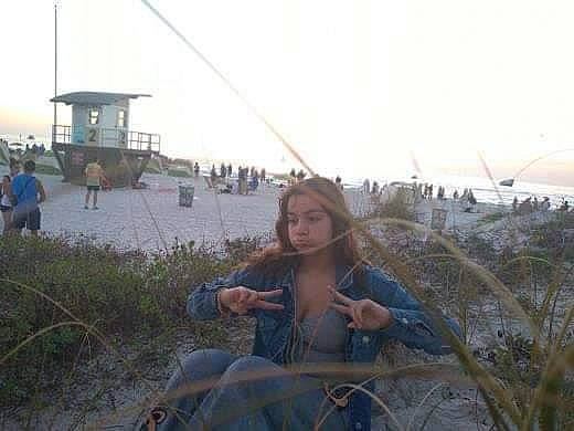 Angelina joined the competition — help win amazing prizes! beach, child, coast, fun, grass, happy, landscape, leisure, morning, ocean, person, plant, recreation, sand, sitting, sky, soil, tourism, travel, vacation