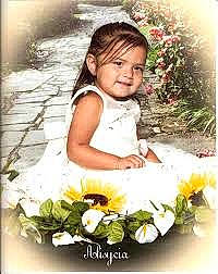 Alisycia is registered to the contest to win money with this photo: baby, baby_toddler_clothing, beauty, bouquet, child, cut_flowers, dress, floral_design, flower, flower_arranging, font, grass, happy, joy, pattern, people_in_nature, person, petal, plant, sitting