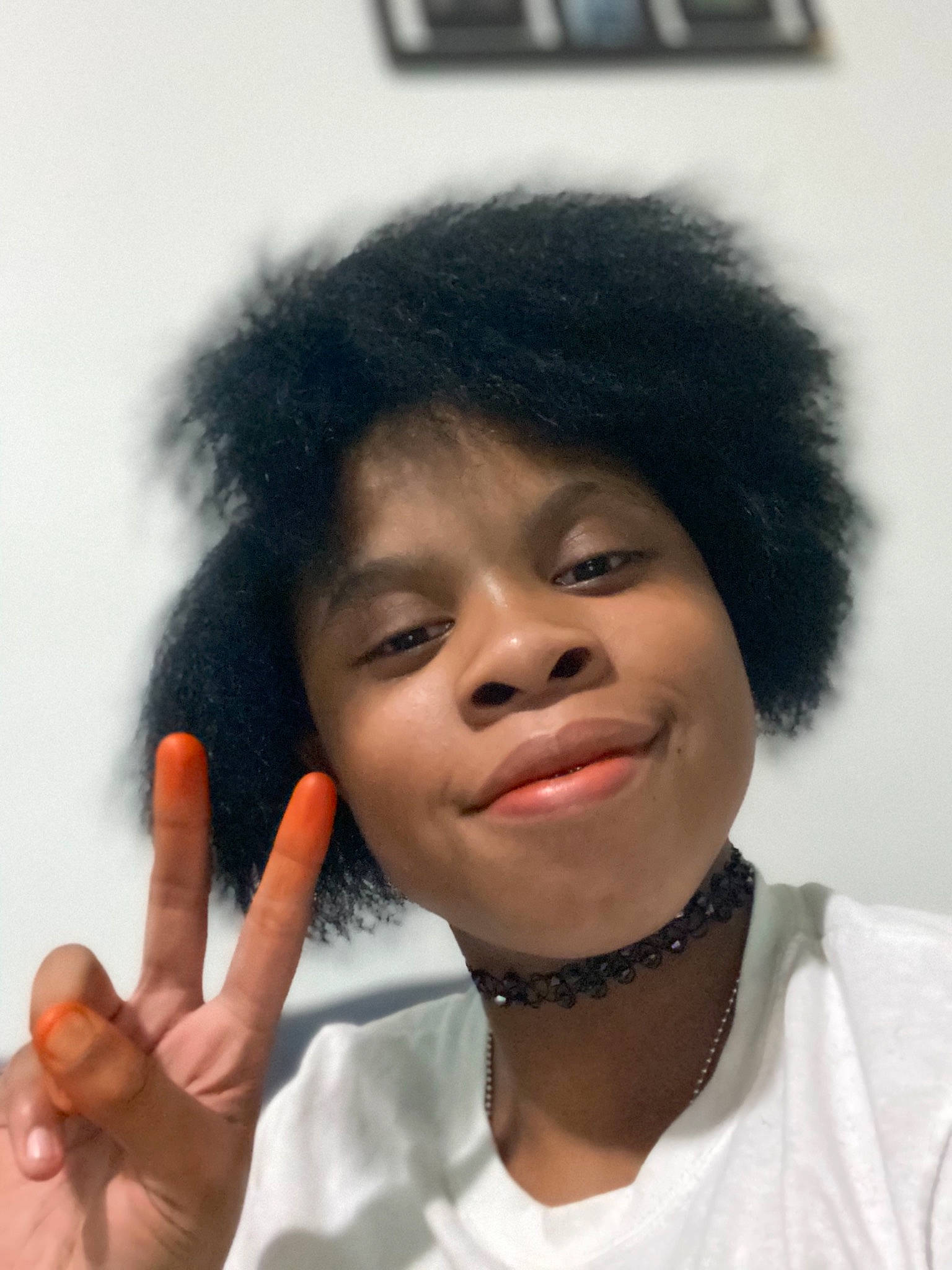 Nikki is registered to the contest to win money with this photo: afro, black_hair, cheek, chin, eyebrow, face, finger, forehead, gesture, hair, hairstyle, joy, lip, nose, person, smile