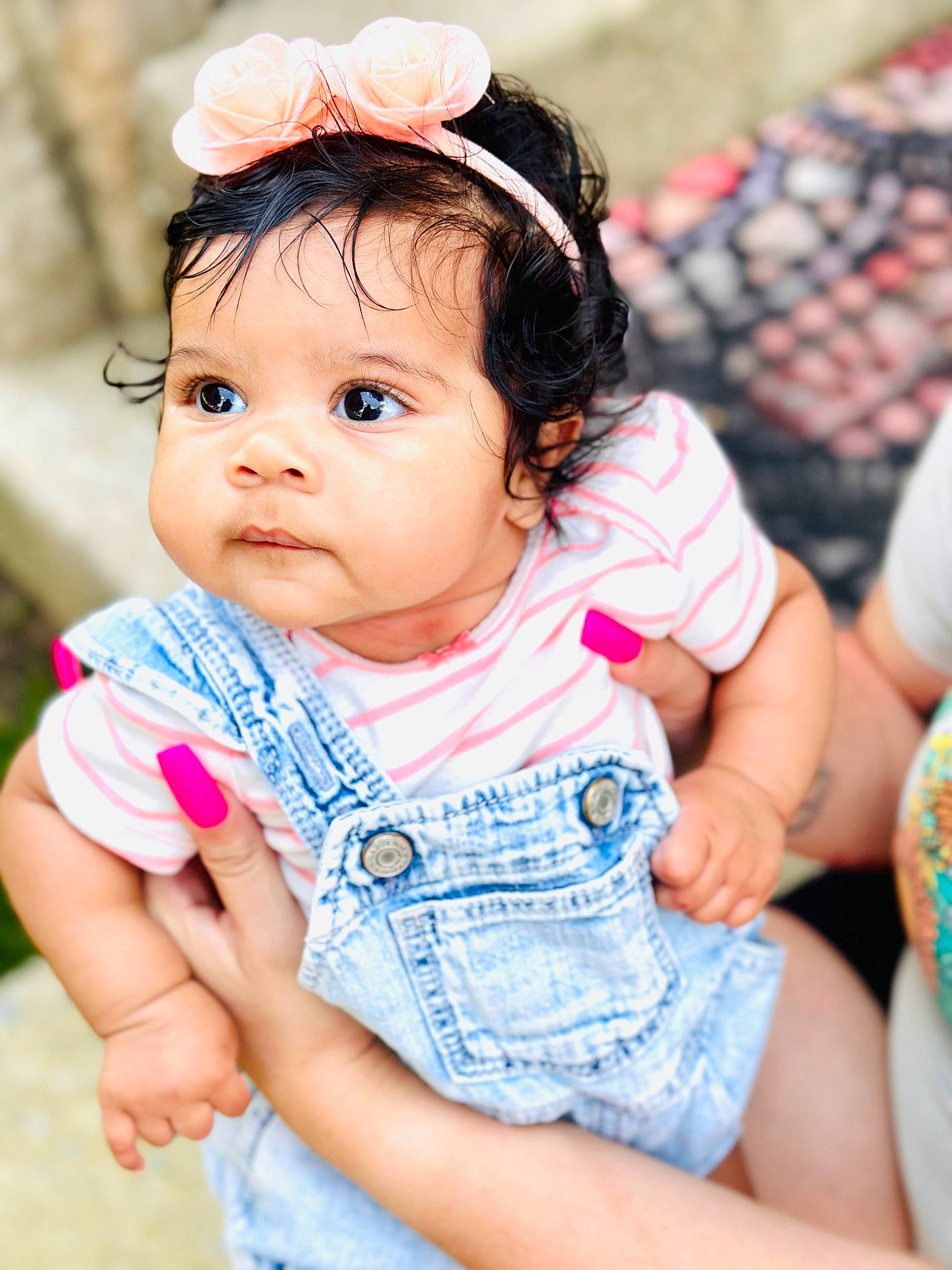 Miami is registered to the contest to win money with this photo: baby, baby_toddler_clothing, blue, cheek, child, chin, eyelash, finger, fun, grass, happy, headpiece, iris, leisure, lip, nose, person, pink, skin, sleeve