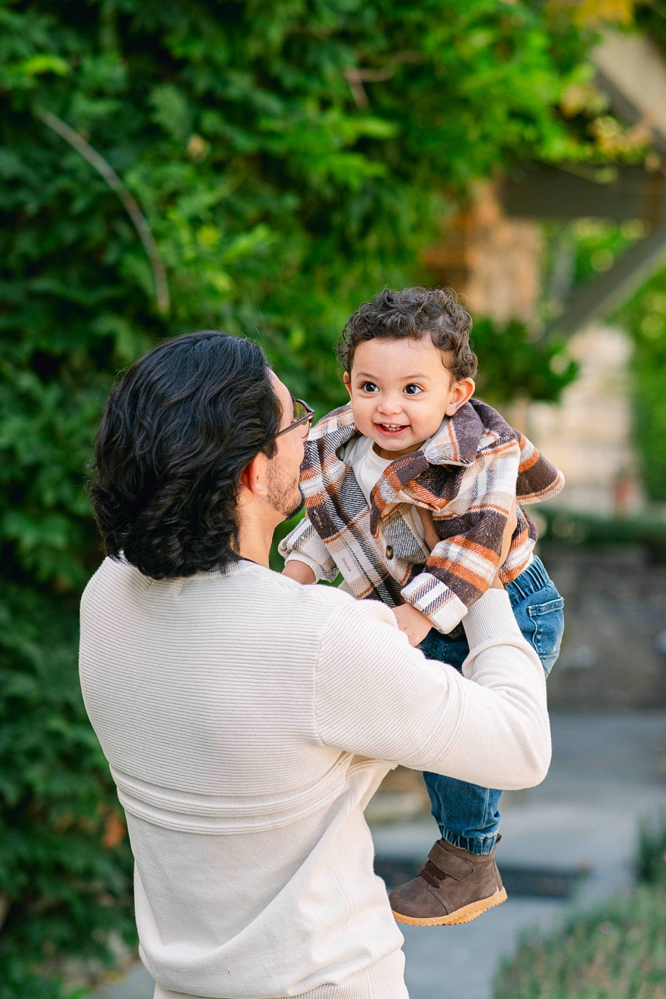 Avery is registered to the contest to win money with this photo: child, event, formal_wear, fun, garden, gesture, grass, happy, hug, leisure, love, people_in_nature, person, plant, portrait_photography, recreation, romance, sitting, smile, toddler