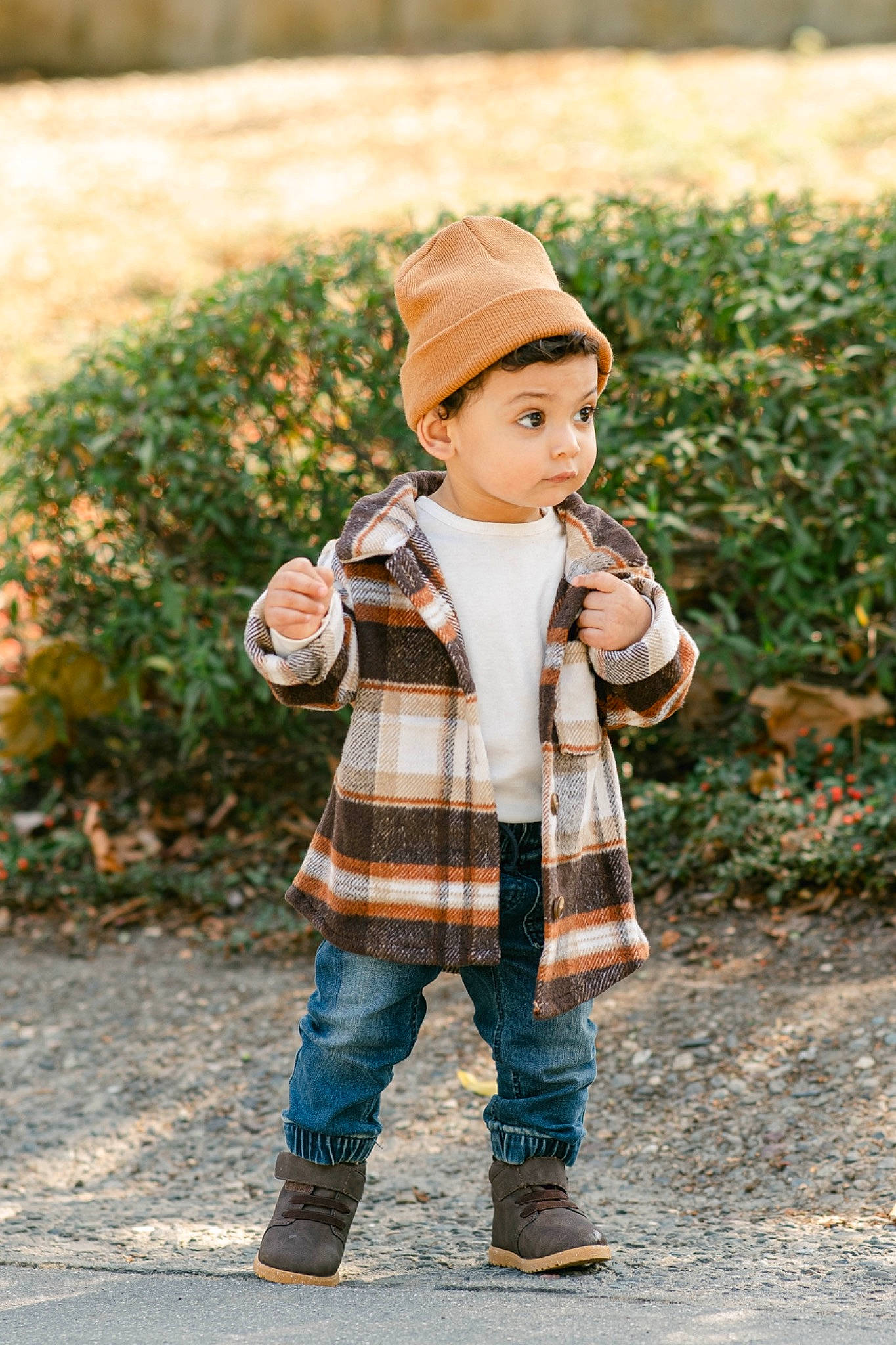 Avery is registered to the contest to win money with this photo: baby, child, denim, grass, happy, hat, headgear, headwear, jacket, outerwear, pattern, people_in_nature, person, plaid, plant, sleeve, standing, sunlight, tartan, toddler