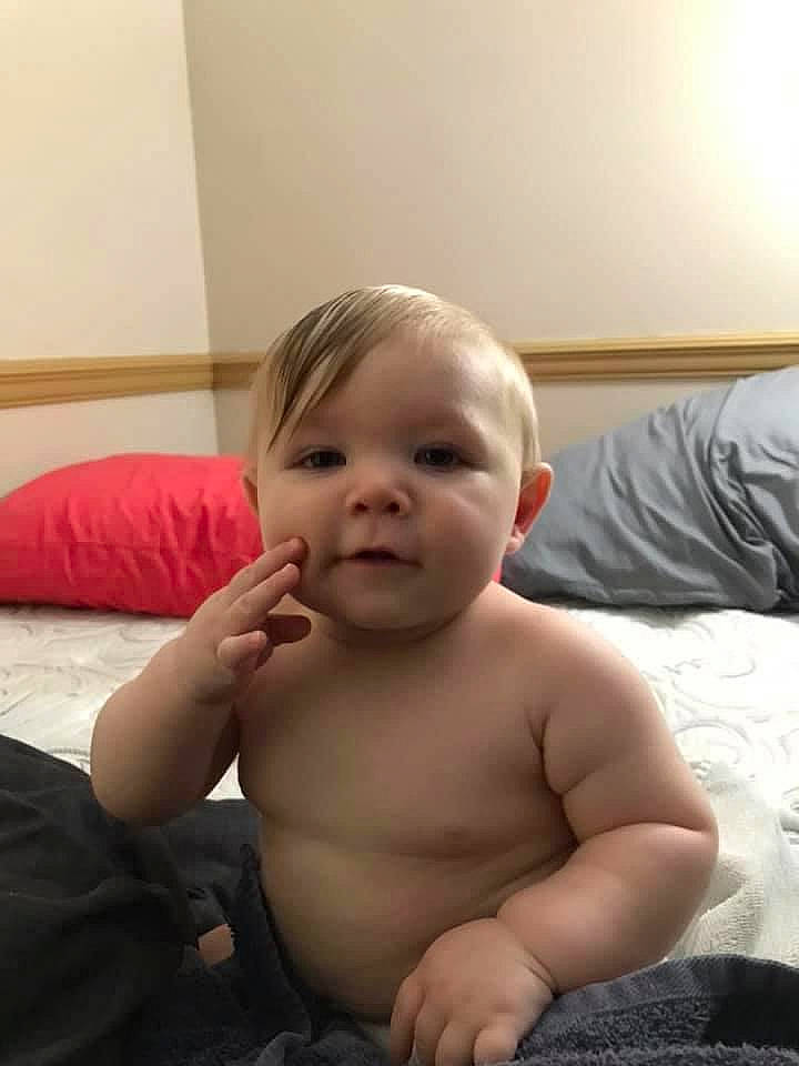 Clayton is registered to the contest to win money with this photo: arm, baby, cheek, child, face, head, leg, mouth, muscle, neck, nose, person, sitting, skin, toddler