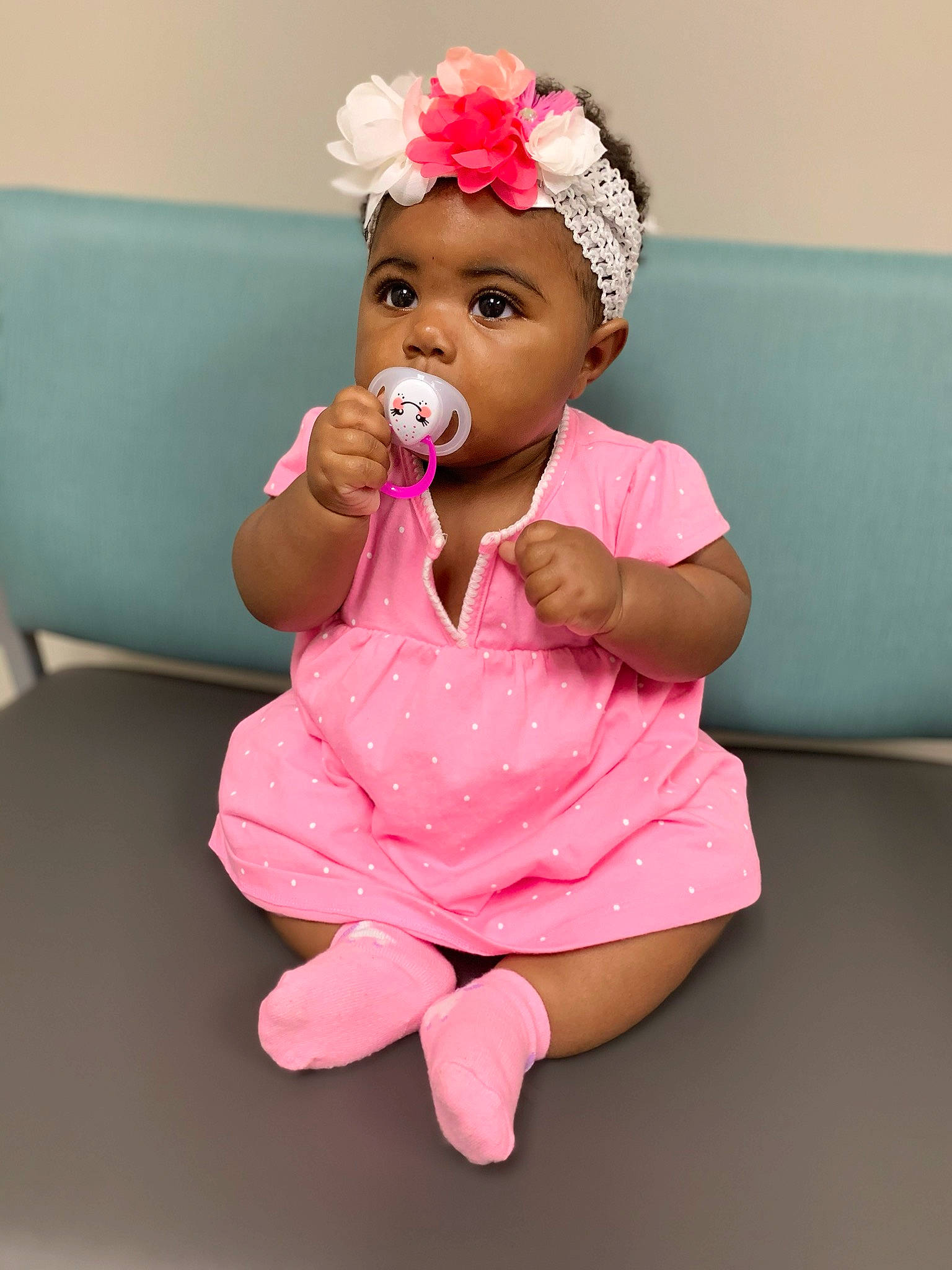 Kashlynn is registered to the contest to win money with this photo: baby, baby_toddler_clothing, cheek, child, child_model, fashion_accessory, finger, fun, hair_accessory, happy, headband, headgear, headpiece, headwear, lip, person, photo_shoot, photography, pink, sitting