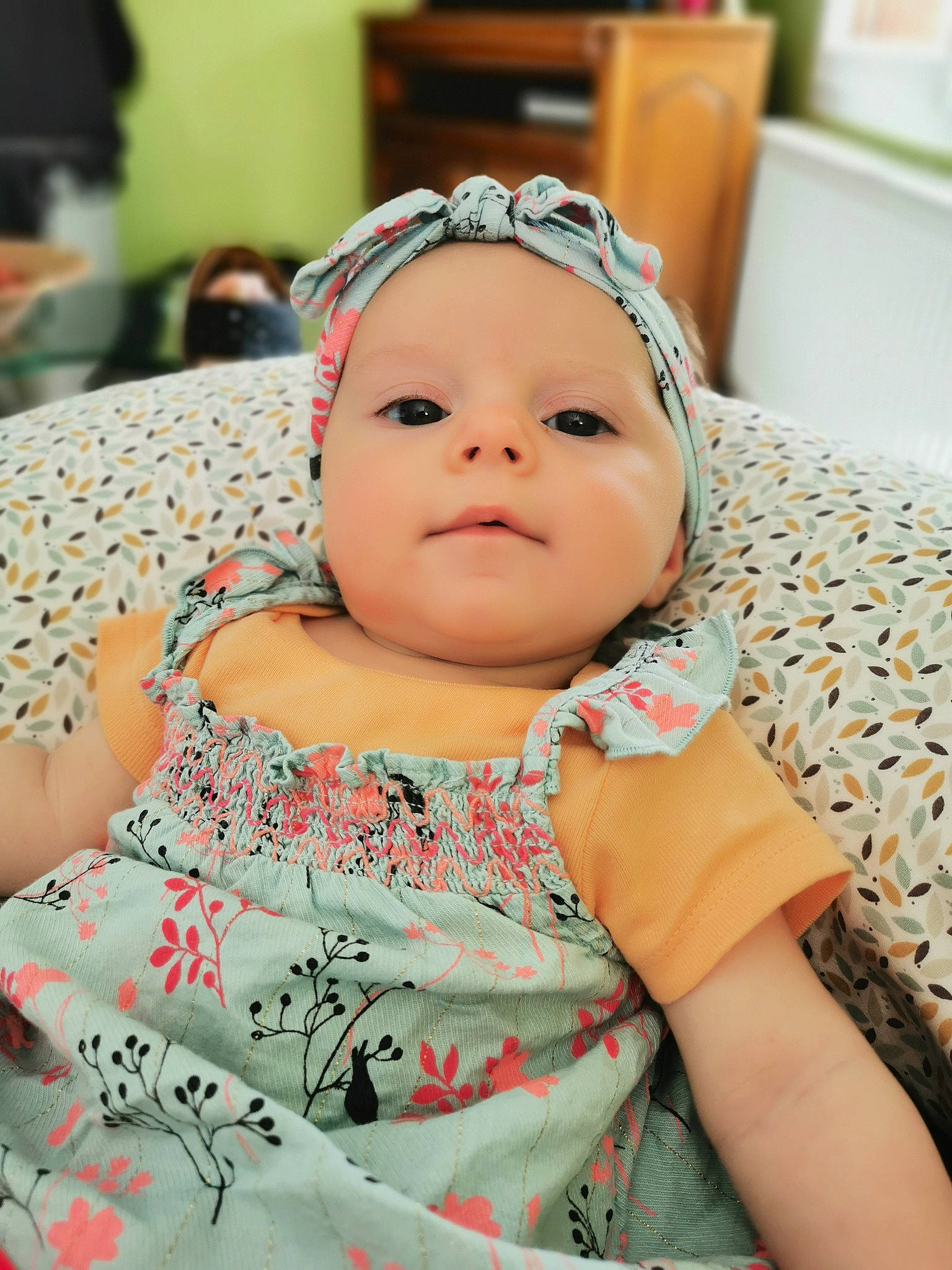 Ambre participe au concours pour gagner de l'argent avec cette photo : baby, baby_toddler_clothing, cheek, child, comfort, event, eyelash, fashion_accessory, happy, hat, headwear, iris, linens, pattern, person, pink, room, sitting, skin, sleeve