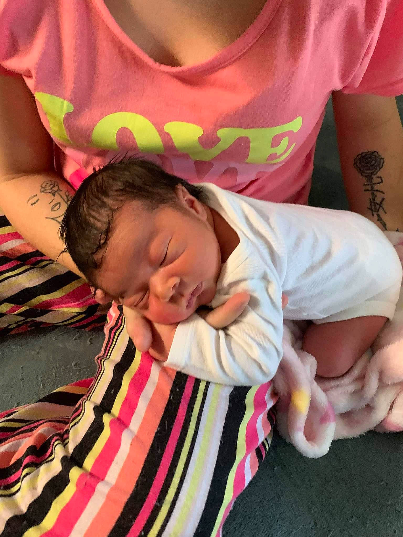 Mulanna is registered to the contest to win money with this photo: cheek, child, comfort, eyelash, facial_expression, finger, fun, gesture, happy, human, human_body, joint, mouth, neck, person, pink, product, skin, sleeve, t_shirt