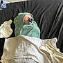 baby, baby_clothes, bed, black_sheet, blanket, clothing, cute, diaper, indoors, infant, newborn, pacifier, peaceful, resting, sleeping, soft, swaddled, towel, white_cloth, wrapped