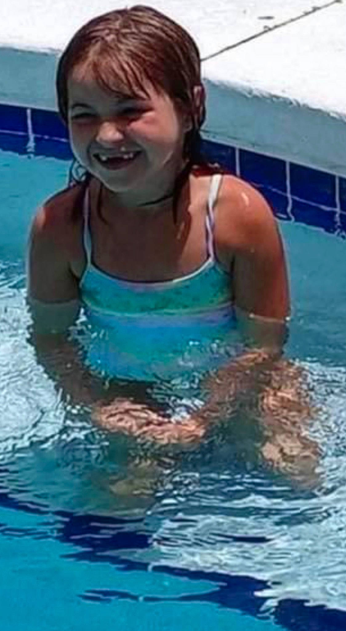 Adriana is registered to the contest to win money with this photo: barechested, bathing, brassiere, chest, fluid, fun, happy, joy, leisure, leisure_centre, liquid, muscle, outdoor_recreation, person, personal_protective_equipment, recreation, smile, swimming_pool, swimwear, throat