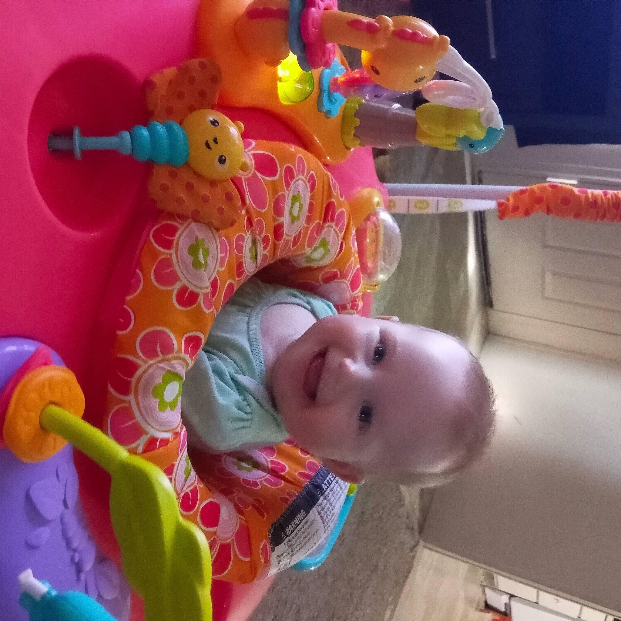 Lilly joined the competition — help win amazing prizes! baby, baby_playing_with_toys, baby_products, baby_toddler_clothing, baby_toys, child, event, fun, happy, joy, magenta, party_supply, person, pink, play, room, smile, stuffed_toy, toddler, toy
