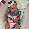 baby, baby_rocker, blue_socks, butterfly, child, clothing, comfort, cute, fabric, happy, harness, headband, indoor, infant, person, playful, portrait, seat, smile, soft