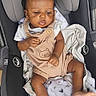 Josiah is registered to the contest to win money with this photo: baby, car_seat, blanket, clothing, child, infant, person, seat, upprababy, cute, relaxed, indoors, soft, pout, curious, small, foot, hand, face, portrait