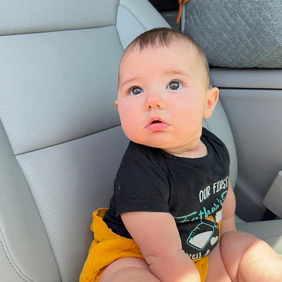 Haven joined the competition — help win amazing prizes! baby, bodypart, car, car_interior, carseat, clothing, cushion, face, finger, hand, head, homedecor, person, photography, portrait, shorts, sitting, t_shirt, transportation, vehicle
