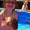 child, children, girl, baby, pool, water, summer, outdoor, sunlight, glasses, cat, pet, play, happy, smile, hair, blue, fun, vacation, family
