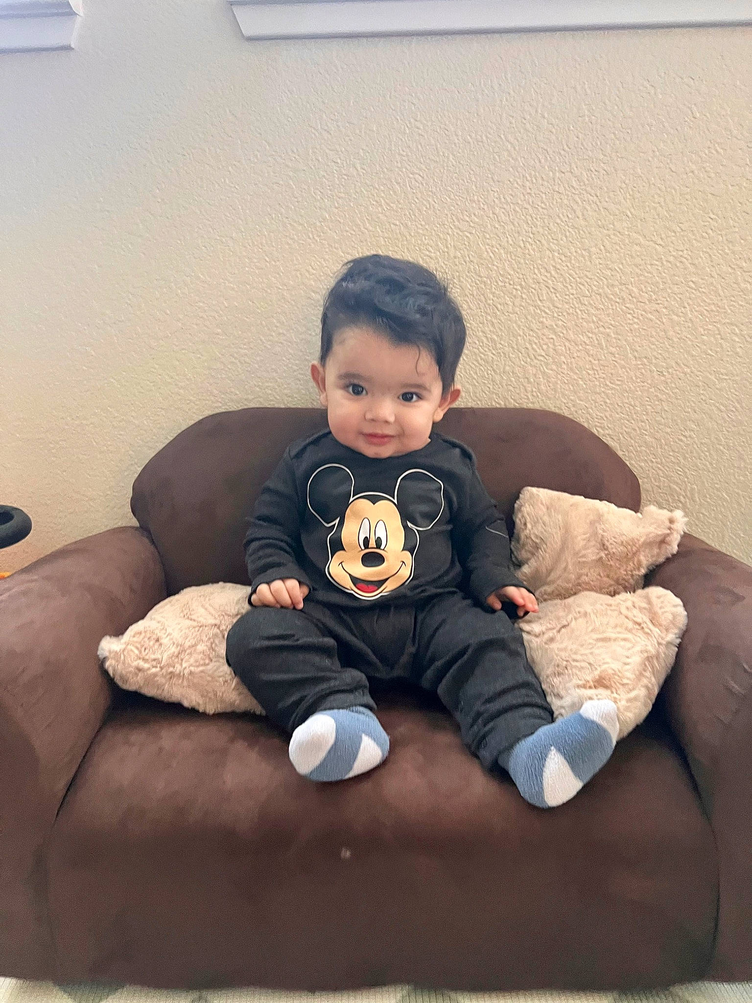 Esteban joined the competition — help win amazing prizes! baby, baby_toddler_clothing, child, comfort, couch, facial_expression, flash_photography, floor, flooring, furniture, hairstyle, happy, knee, living_room, person, pillow, sleeve, t_shirt, thigh, toddler