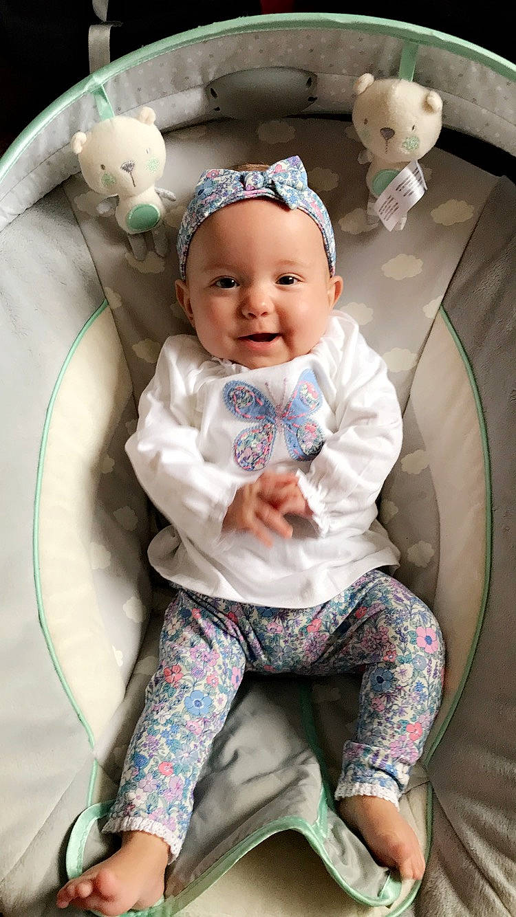 Dolly is registered to the contest to win money with this photo: baby, baby_products, baby_toddler_clothing, child, person, product, smile, toddler