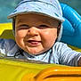 baby, child, smiling, hat, inflatable, pool, water, yellow, blue, sunny, outdoor, cute, face, cheerful, summer, floating, playful, closeup, headwear, joyful