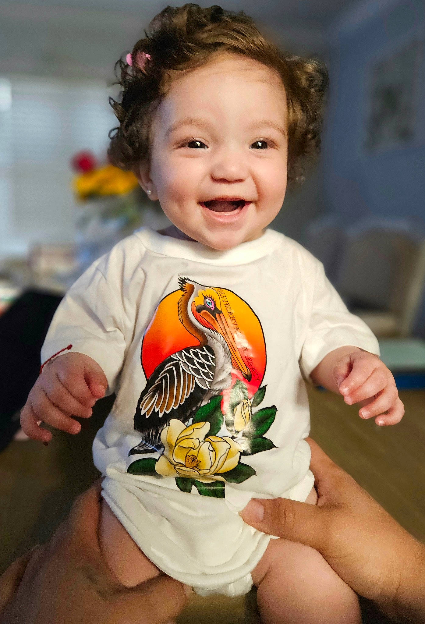 Maria is registered to the contest to win money with this photo: arthropod, baby, baby_products, baby_toddler_clothing, beak, bird, child, face, fun, hand, happy, insect, joy, nail, person, pollinator, skin, sleeve, smile, t_shirt