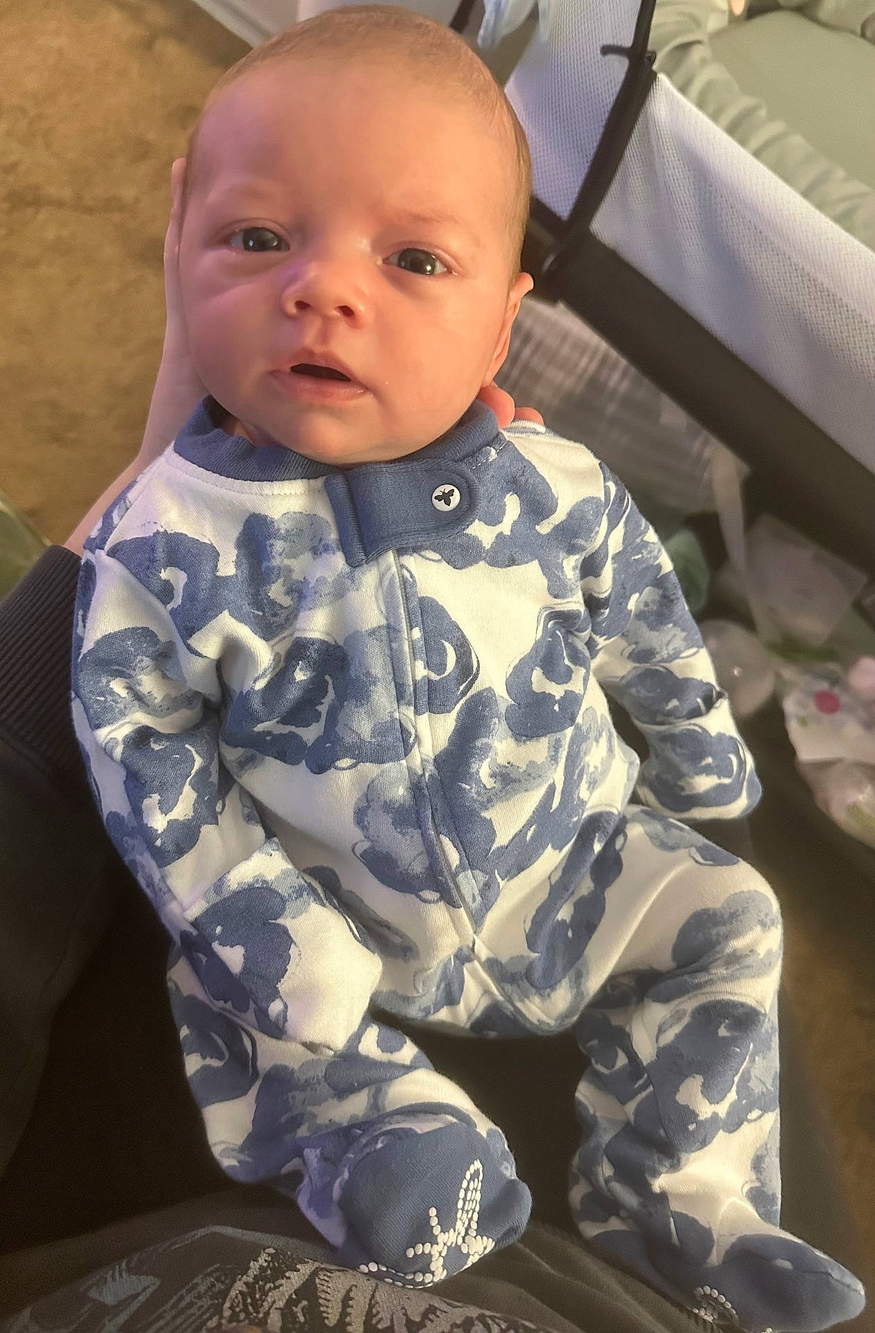 Calvin joined the competition — help win amazing prizes! baby, clothing, coat, cushion, face, frown, furniture, head, homedecor, jacket, jeans, military, militaryuniform, pants, person, photography, portrait, sad, sitting, sleeve