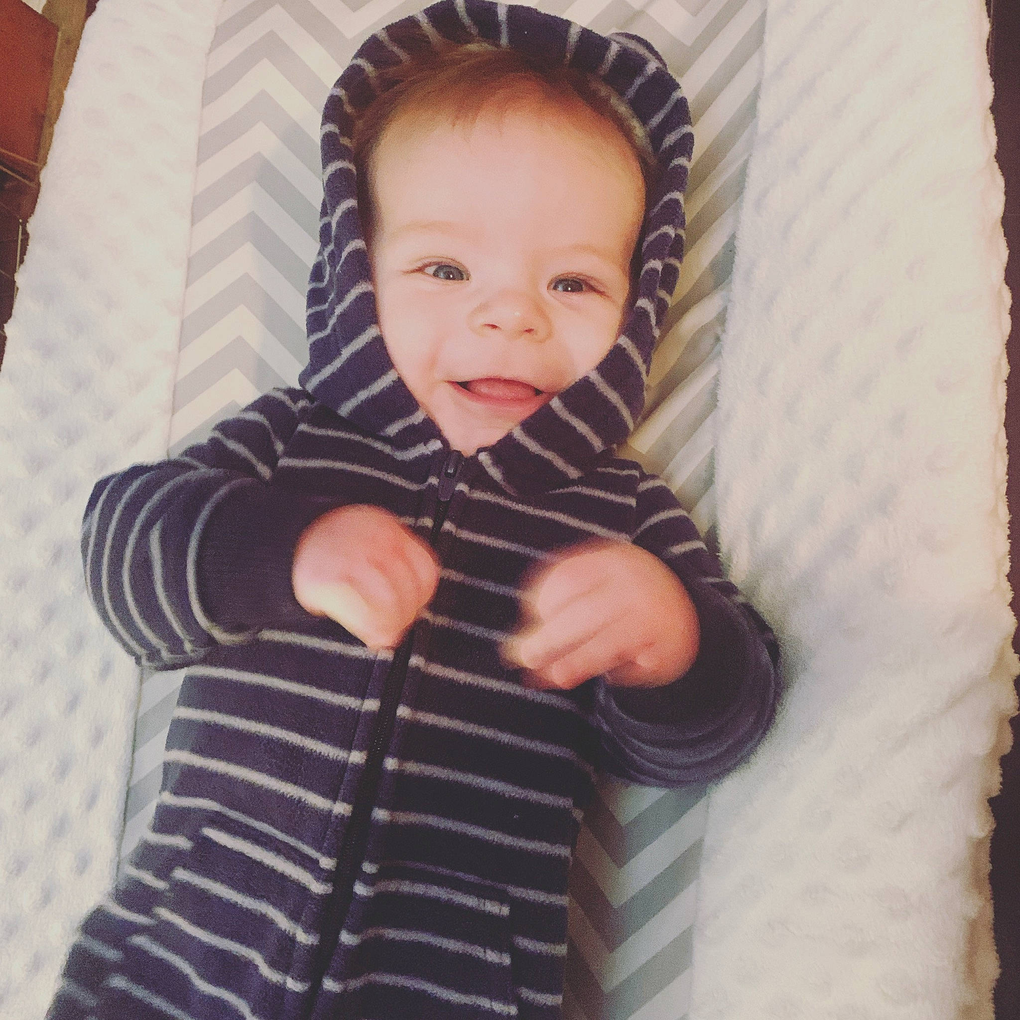 Trypp is registered to the contest to win money with this photo: arm, baby, baby_products, baby_safety, baby_sleeping, baby_toddler_clothing, comfort, eyelash, gesture, head, iris, outerwear, pattern, person, skin, sleeve, t_shirt, textile, thumb, tints_and_shades