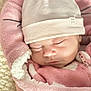 Janna a rejoint le concours — aidez-le/la à gagner de superbes lots ! newborn, baby, sleeping, pink_blanket, white_hat, cozy, soft, face, infant, child, peaceful, warm, zipped_jacket, cute, portrait, wrapped, closeup, indoors, resting, adorable