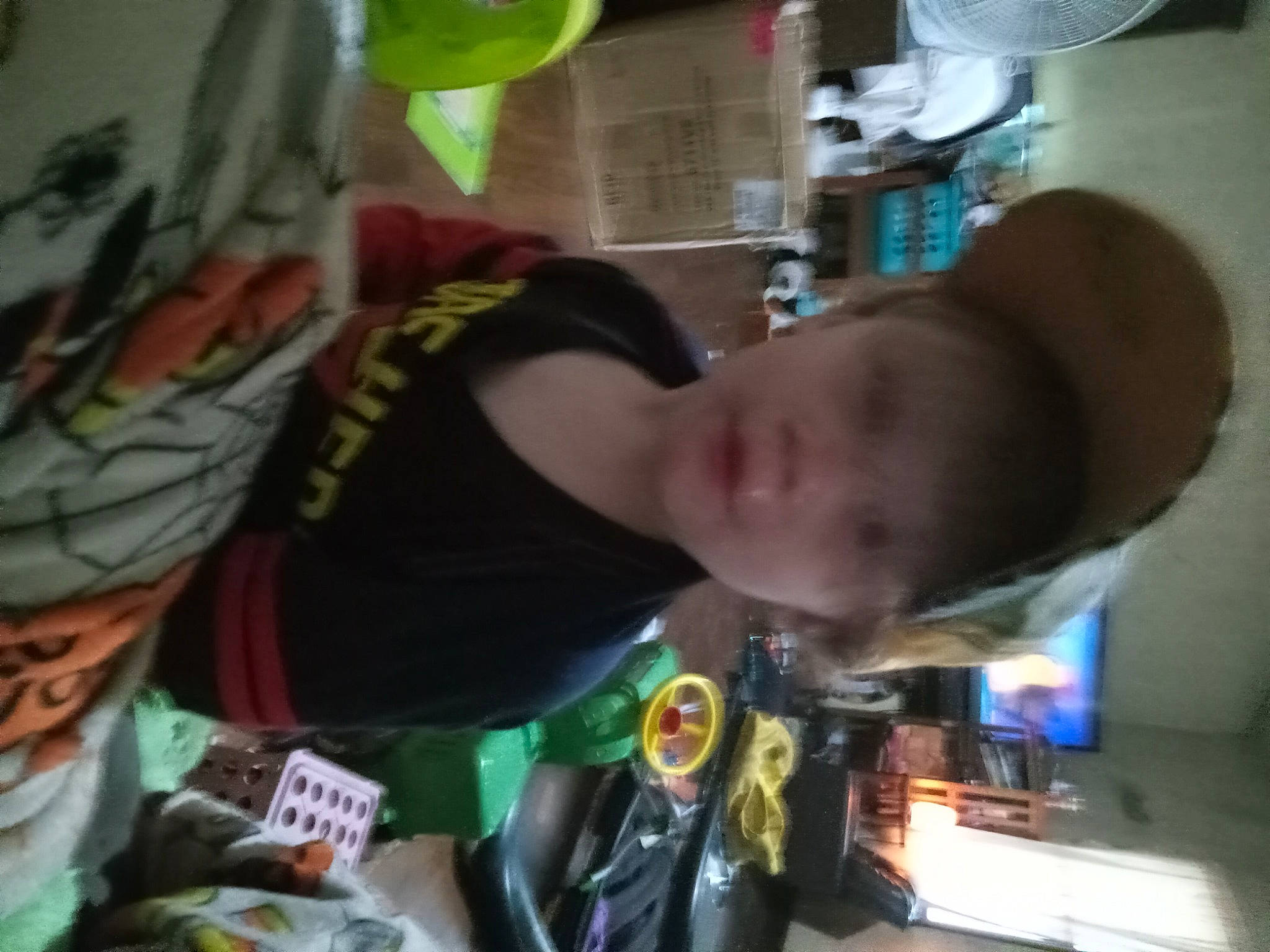 Hunter is registered to the contest to win money with this photo: baby, child, fun, green, person, room, t_shirt, toddler