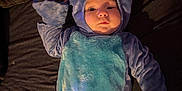 Paisley Marie Taylor joined the competition — help win amazing prizes! adorable, baby, blanket, blue, child, childhood, costume, cozy, cute, cute_outfit, face, headwear, indoor, infant, lying_down, one_person, plush, portrait, sleepwear, soft_toys