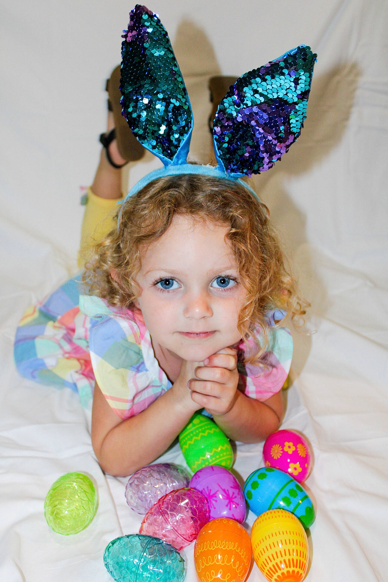 Addilynn is registered to the contest to win money with this photo: aqua, baby_playing_with_toys, baby_toddler_clothing, blue, child, costume_hat, facial_expression, fun, green, happy, headpiece, party_hat, party_supply, person, pink, product, purple, textile, toddler, white