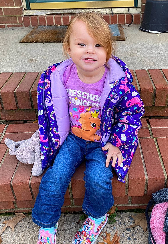 Emily joined the competition — help win amazing prizes! baby_toddler_clothing, blue, child, clothing, electric_blue, face, hair, happy, head, joy, leg, person, pink, purple, shoe, sleeve, smile, snapshot, t_shirt, thigh