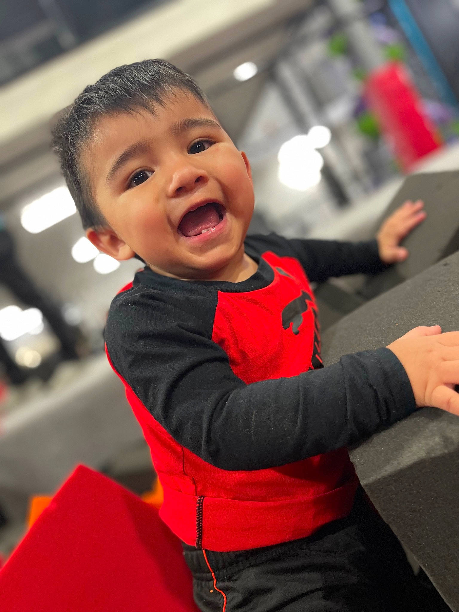 Emilio is registered to the contest to win money with this photo: aerospace_engineering, automotive_design, carmine, child, event, flash_photography, fun, gesture, glove, happy, jacket, luxury_vehicle, motor_vehicle, person, personal_protective_equipment, recreation, sitting, sleeve, smile, t_shirt