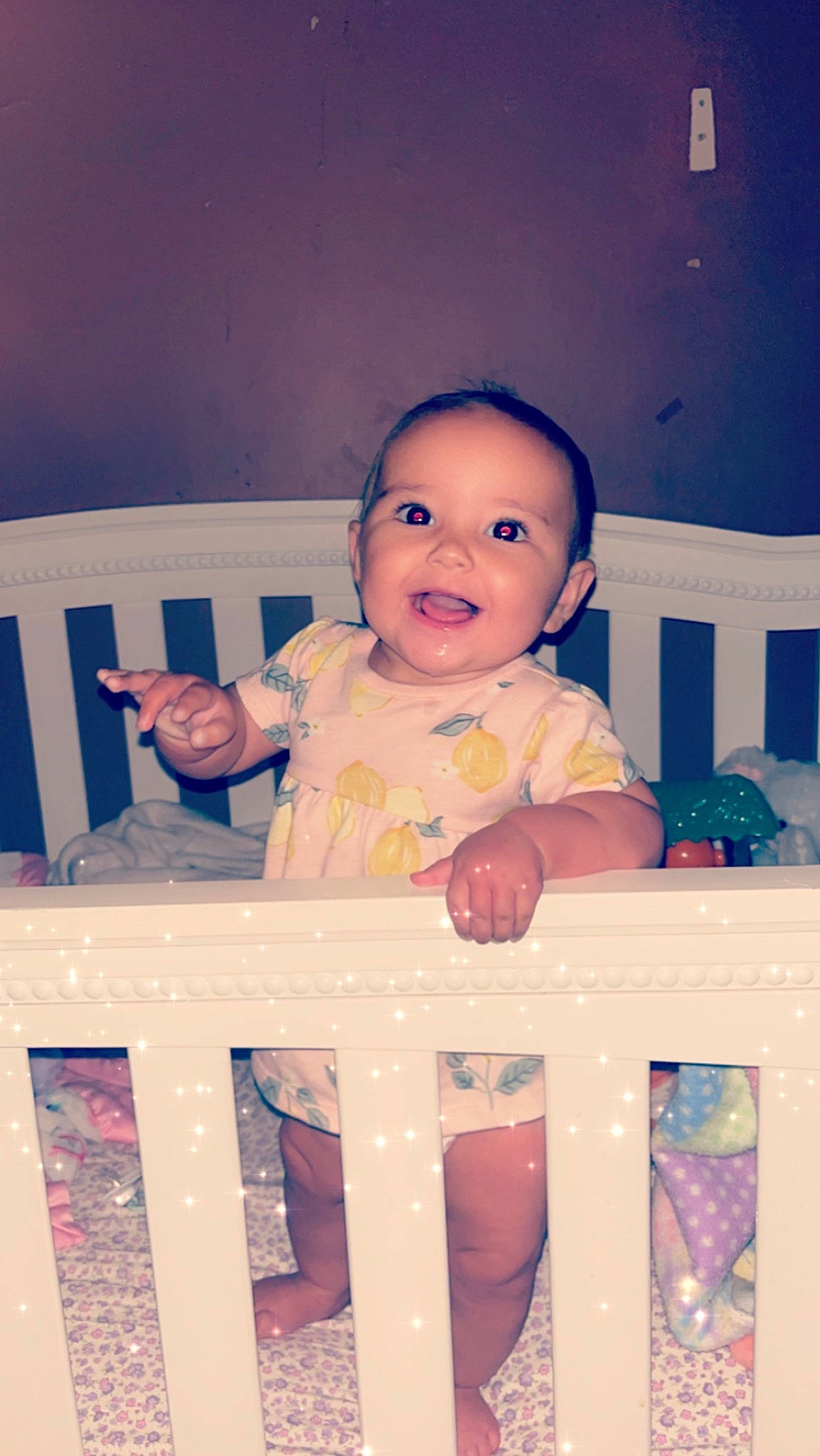 Myah joined the competition — help win amazing prizes! baby, baby_safety, baby_toddler_clothing, black, cheek, cradle, eye, facial_expression, fun, hairstyle, happy, head, infant_bed, nursery, person, pink, product, purple, skin, smile