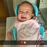 Luna participe au concours pour gagner de l'argent avec cette photo : baby, child, smiling, pink_outfit, bunny_design, blue_chair, indoor, happy, cute, infant, seated, person, face, clothing, toddler, baby_girl, expression, joyful, young_child, portrait