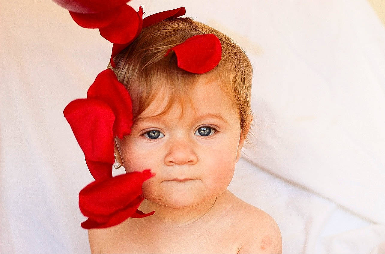 Vincent joined the competition — help win amazing prizes! baby, baby_toddler_clothing, bathing, blond, costume_hat, ear, eye, eyelash, face, gesture, hair_accessory, happy, hat, head, headgear, headpiece, lip, person, petal, skin