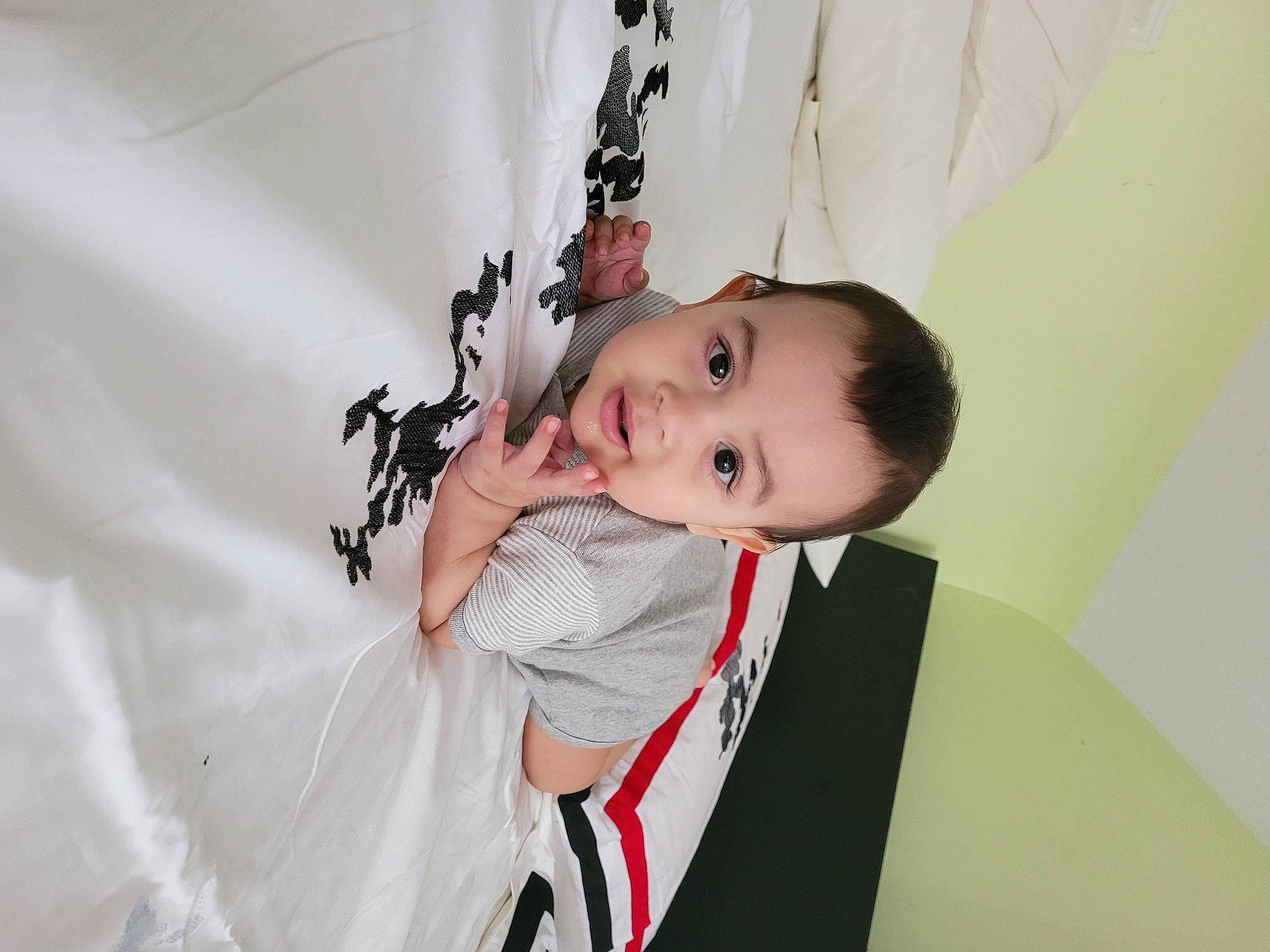 Iker joined the competition — help win amazing prizes! baby, baby_products, baby_toddler_clothing, black_hair, comfort, elbow, eyelash, fashion_accessory, formal_wear, fun, happy, iris, neck, pattern, person, room, shoulder, sitting, sleeve, toddler