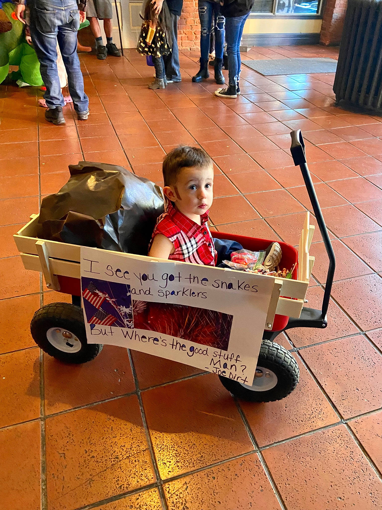 Cason is registered to the contest to win money with this photo: baby_carriage, baby_products, bag, cart, child, flooring, fun, handwriting, leisure, luggage_and_bags, mode_of_transport, motor_vehicle, person, road_surface, sidewalk, surprise, tire, toddler, travel, vehicle