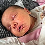 Hartleigh joined the competition — help win amazing prizes! newborn, baby, sleeping, infant, blanket, soft, face, closeup, cozy, peaceful, resting, clothing, pink, white, texture, portrait, young_child, cute, indoors, tender