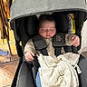 Nino a rejoint le concours — aidez-le/la à gagner de superbes lots ! baby, blanket, canopy, car_seat, clothing, denim, hand, harness, indoor, infant, nap, newborn, pacifier, pacifier_clip, peaceful, seat_padding, sleeping, stroller, tile_floor, warning_label