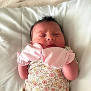 Eriyah joined the competition — help win amazing prizes! newborn, baby, sleeping, pillow, pink_mittens, floral_outfit, infant, soft_light, face, closed_eyes, cute, resting, indoors, skin, human, baby_clothes, newborn_baby, peaceful, portrait, child