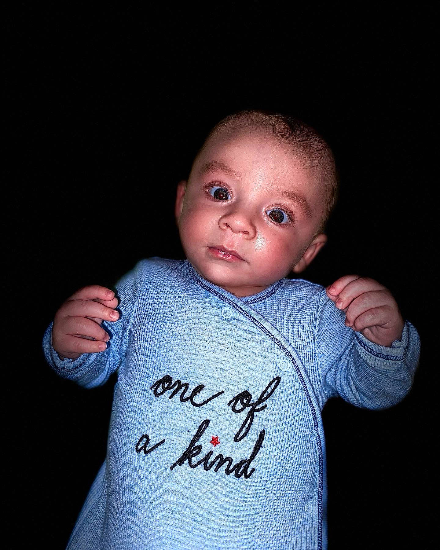Landen joined the competition — help win amazing prizes! arm, baby, baby_toddler_clothing, cheek, eye, finger, flash_photography, gesture, grey, hand, head, human_body, iris, neck, nose, person, shoulder, sleeve, standing, textile