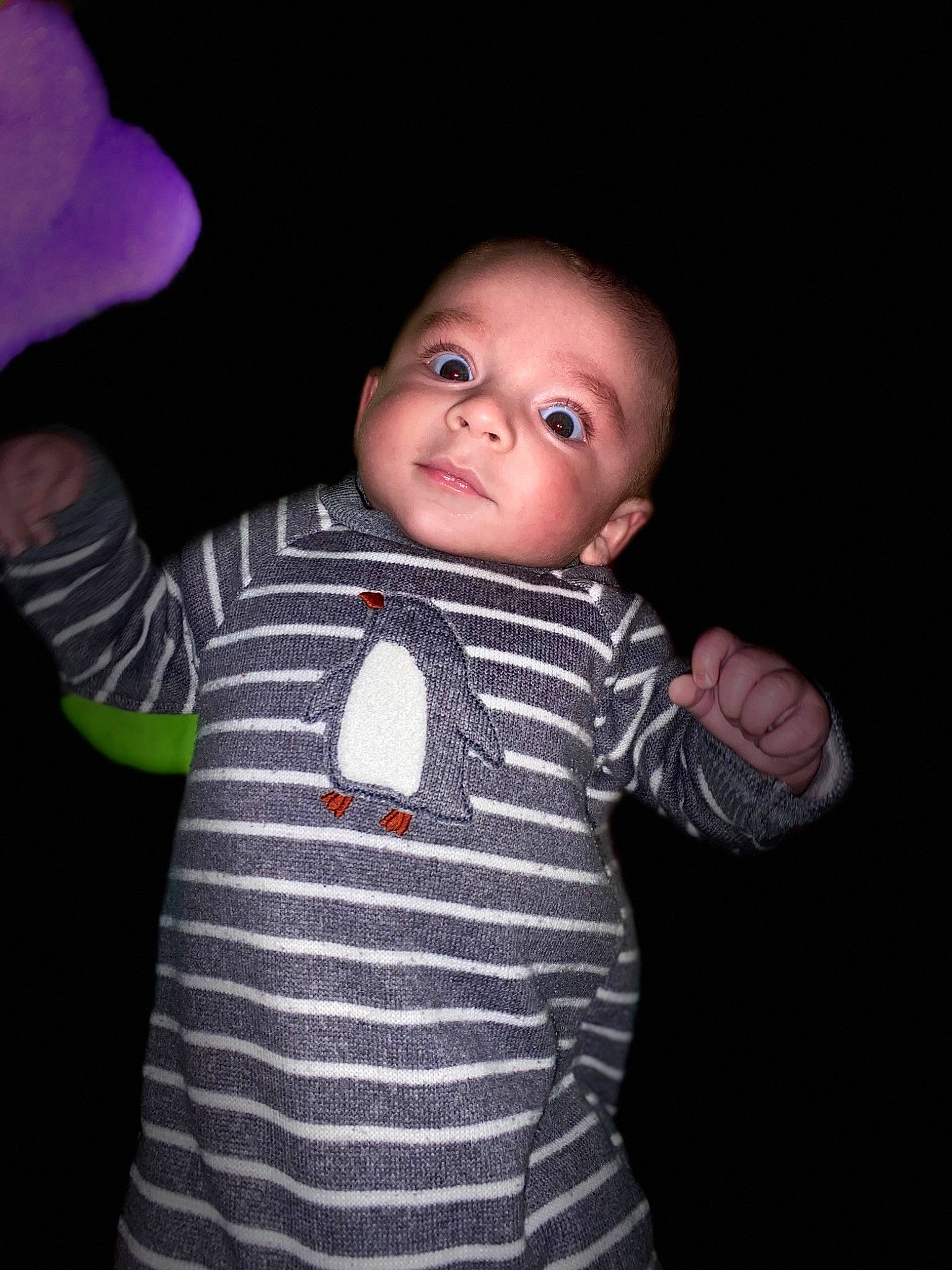 Landen joined the competition — help win amazing prizes! baby, baby_toddler_clothing, cheek, child, collar, darkness, eye, finger, flash_photography, gesture, iris, lip, nose, pattern, person, skin, sleeve, standing, t_shirt, thumb