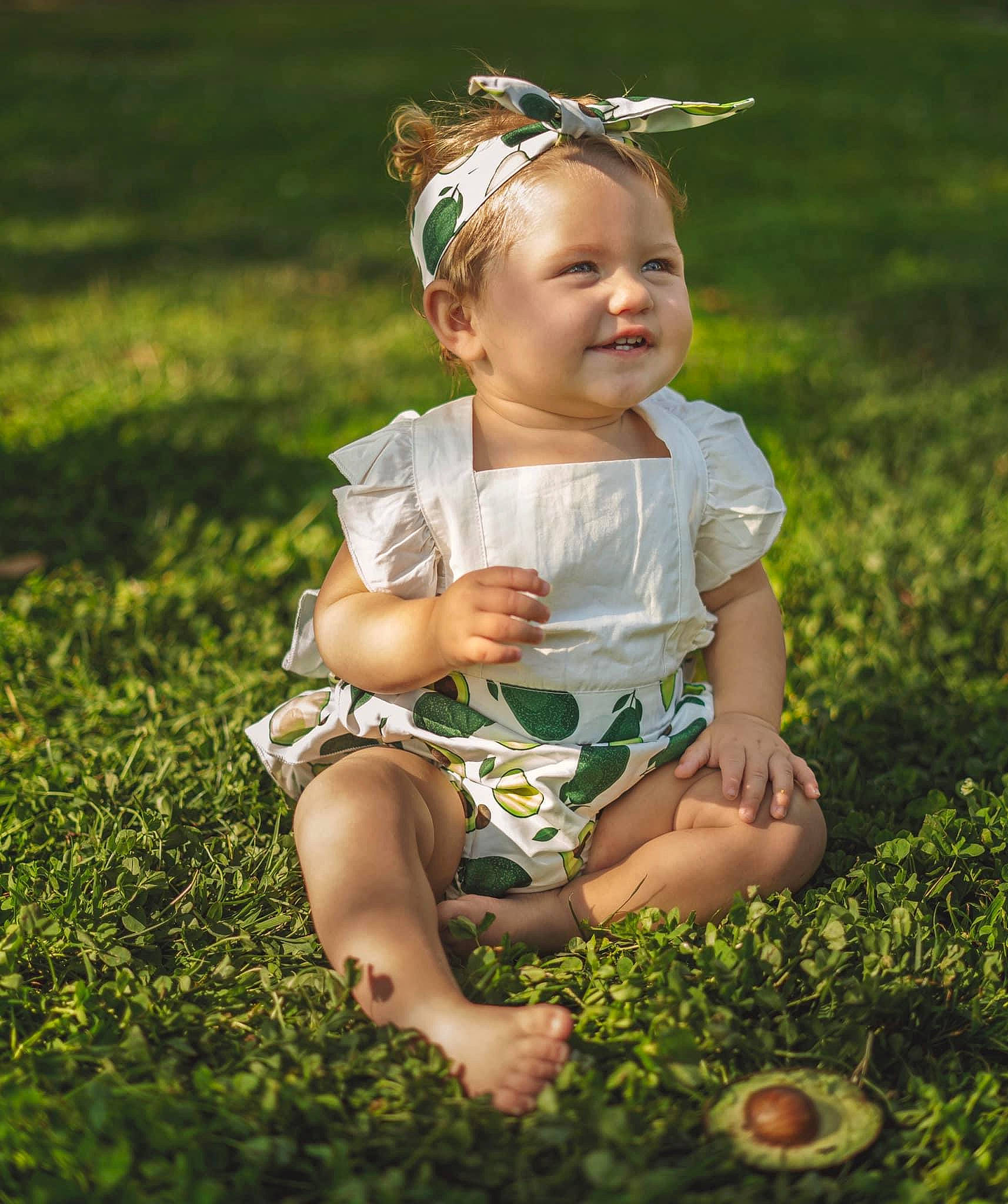 Penelope joined the competition — help win amazing prizes! baby, baby_toddler_clothing, dress, eye, face, flash_photography, fun, grass, grass_family, grassland, happy, headpiece, leaf, meadow, people_in_nature, person, plant, skin, smile, sunlight