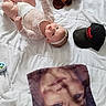 Scarlett joined the competition — help win amazing prizes! baby, baseballcap, bed, bedroom, blanket, cap, clothing, cushion, face, furniture, hat, head, homedecor, indoors, person, photography, portrait, room, teddybear, toy