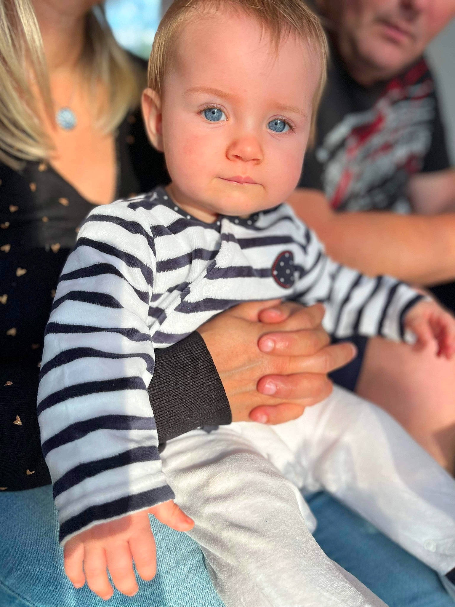 Naomie participe au concours pour gagner de l'argent avec cette photo : baby, baby_toddler_clothing, cheek, child, comfort, event, finger, fun, gesture, happy, lap, pattern, people, person, shoulder, sitting, skin, sleeve, t_shirt, thumb