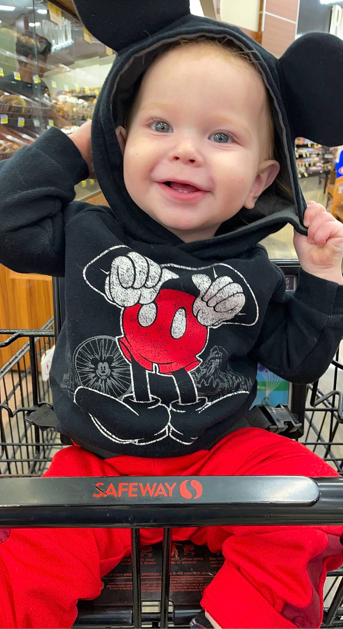 Elliot is registered to the contest to win money with this photo: baby, baby_toddler_clothing, black, carmine, cheek, child, costume, event, happy, joy, pattern, person, photograph, product, recreation, sitting, sleeve, smile, snapshot, t_shirt