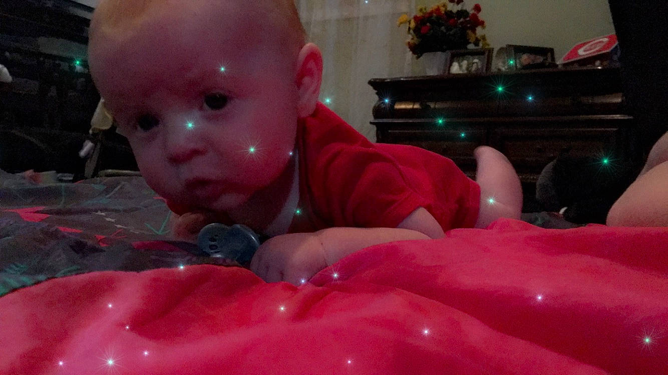 Carson is registered to the contest to win money with this photo: baby, cheek, child, mouth, person, pink, toddler