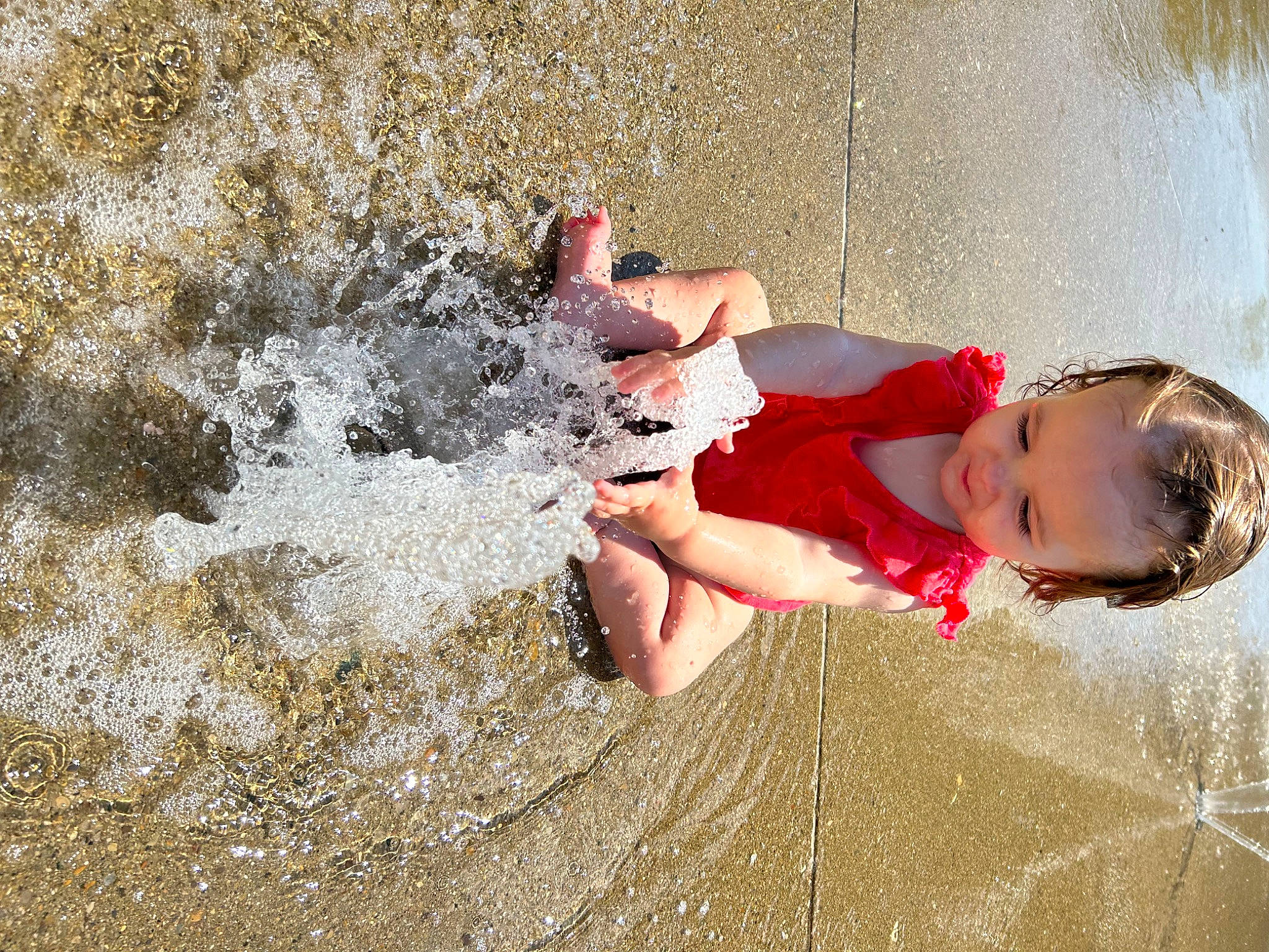 Paisley is registered to the contest to win money with this photo: barefoot, beach, child, dress, fun, happy, human_body, landscape, leg, leisure, people_in_nature, people_on_beach, person, play, recreation, sand, shorts, soil, toddler, water