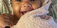 Jude participe au concours pour gagner de l'argent avec cette photo : baby, towel, smile, face, hand, blanket, skin, eyes, happy, cute, infant, child, portrait, indoors, closeup, soft, texture, fabric, expression, wrapped