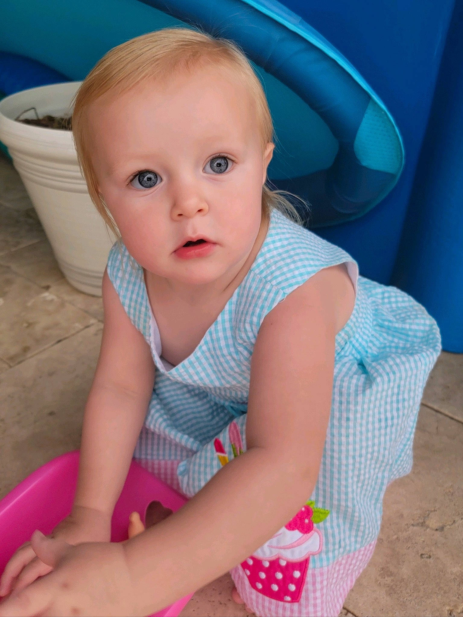 Bexlee is registered to the contest to win money with this photo: baby, baby_toddler_clothing, blue, cheek, child, chin, comfort, electric_blue, eye, finger, fun, iris, mouth, neck, nose, person, pink, sitting, skin, sleeve