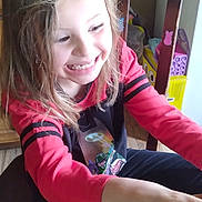 Kara joined the competition — help win amazing prizes! batman, black_clothing, chair, child, food, fork, hand, happy, indoor, kitchen, long_hair, macaroni_and_cheese, meal, red_clothing, smiling, spiderman, stickers, superhero, table, wooden_table