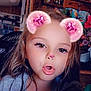Kara is registered to the contest to win money with this photo: child, face, portrait, filter, pink, bear_ears, nose, sparkle, long_hair, expression, indoor, casual, selfie, young, cute, fun, playful, glossy_lips, brown_eyes, person
